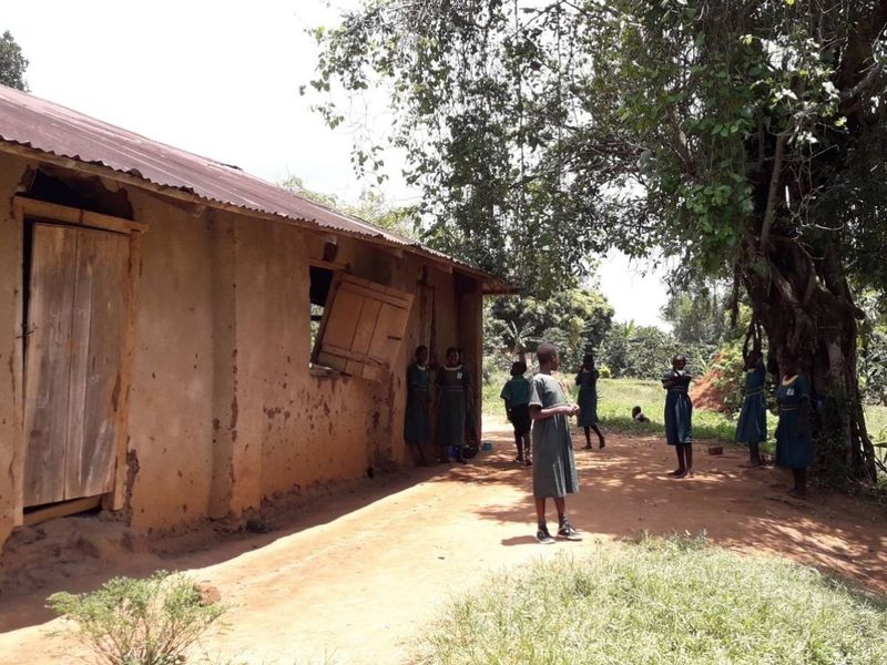 Kids in front of house